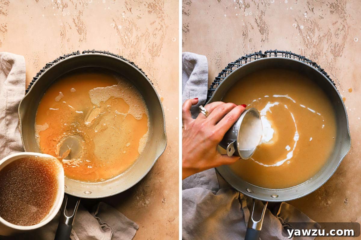 Adding the turkey stock and milk to finish making homemade turkey gravy in a pan, whisking for a smooth consistency.