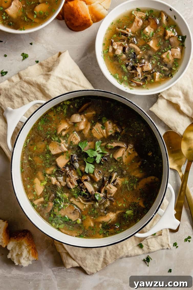 Overhead photo of pot of soup with smaller bowl in background.