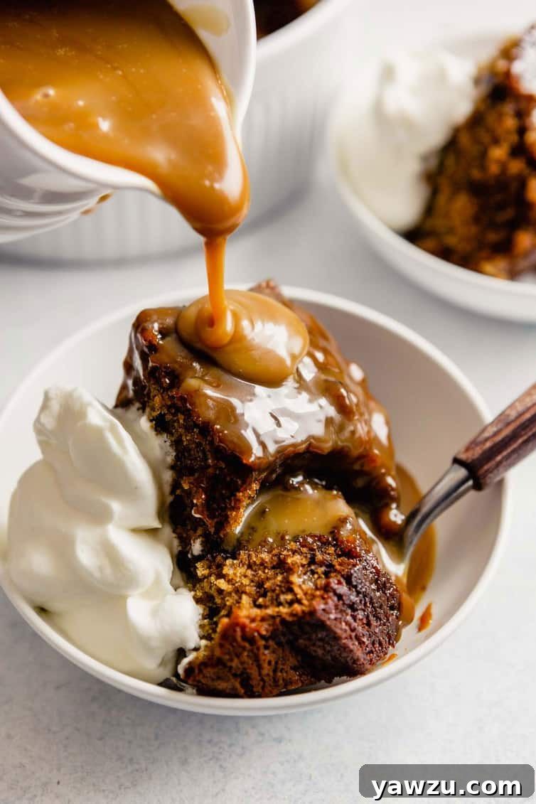 Pouring toffee sauce on sticky toffee pudding.