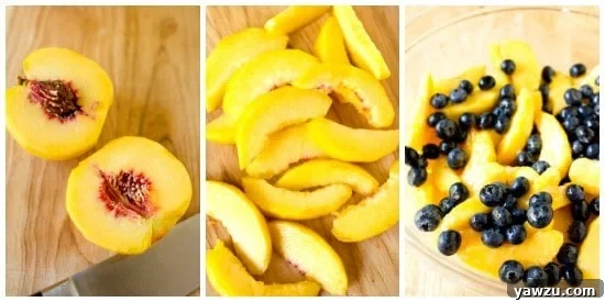 Close-up of baked peach and blueberry crumble bubbling with juices