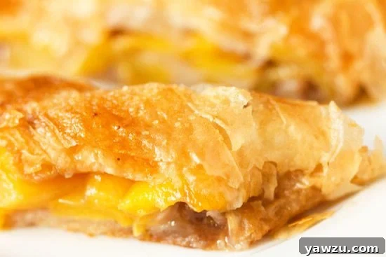 Assembling the Peach Strudel with phyllo dough