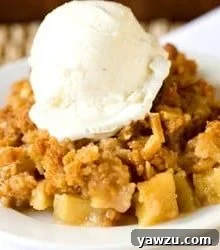 Overhead view of a baked Almond-Apple Crisp, golden and inviting
