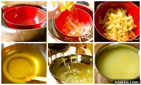 Pouring infused alcohol through a colander to remove lemon peels