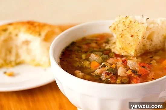 Hearty Minestrone Soup, a classic Italian comfort food packed with vegetables and beans.