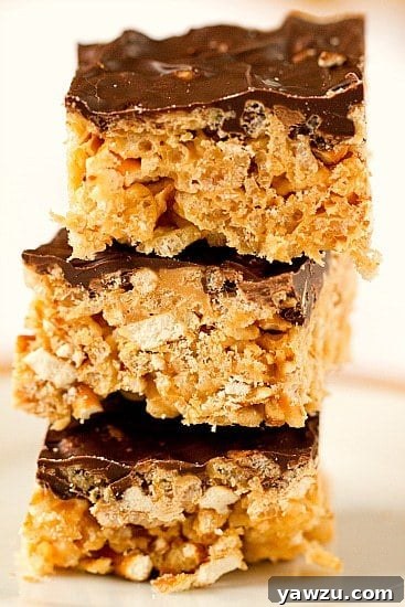 Delicious Chubby Hubby Rice Krispies Treats with a generous chocolate topping.
