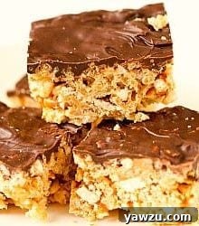 A stacked image showing four Chubby Hubby Rice Krispies treats topped with a smooth layer of chocolate.