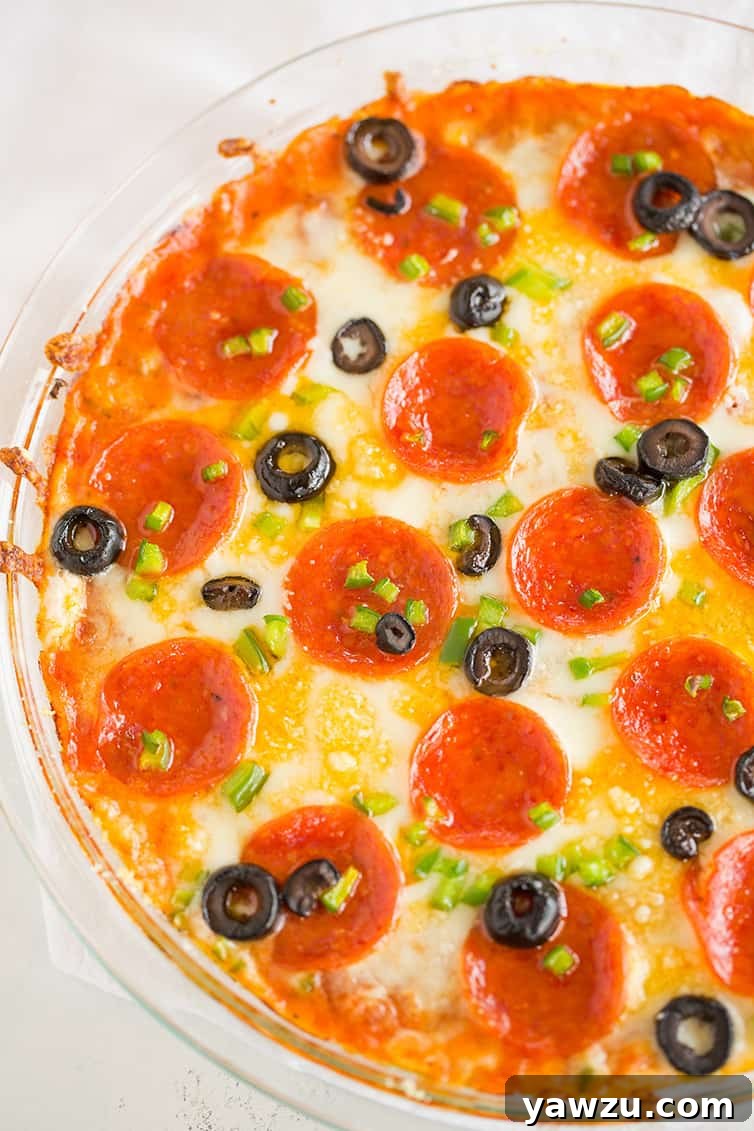 An overhead shot of pizza dip in a pie plate.