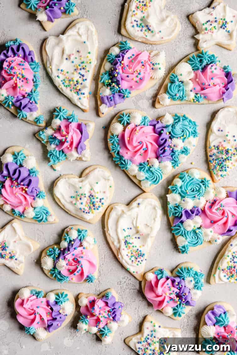 Overhead photo of sugar cookies decorated with buttercream frosting.