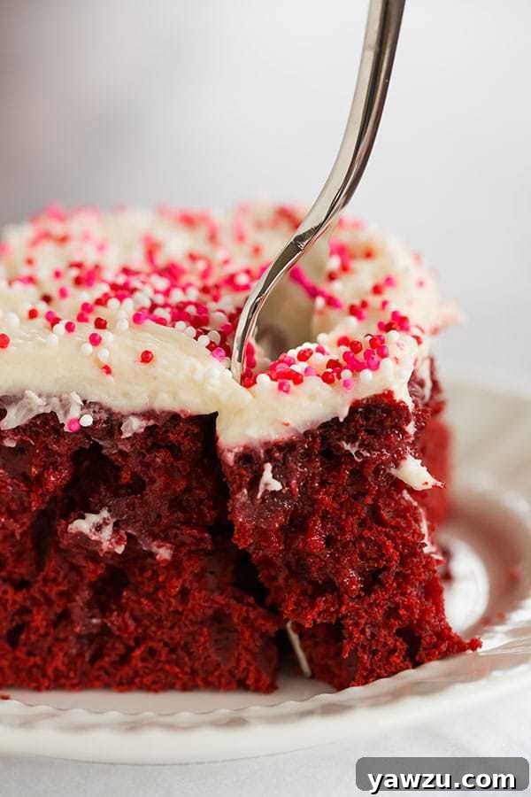 Red velvet cake is infused with sweetened condensed milk and topped with the best cream cheese frosting. A must for Valentine's Day!