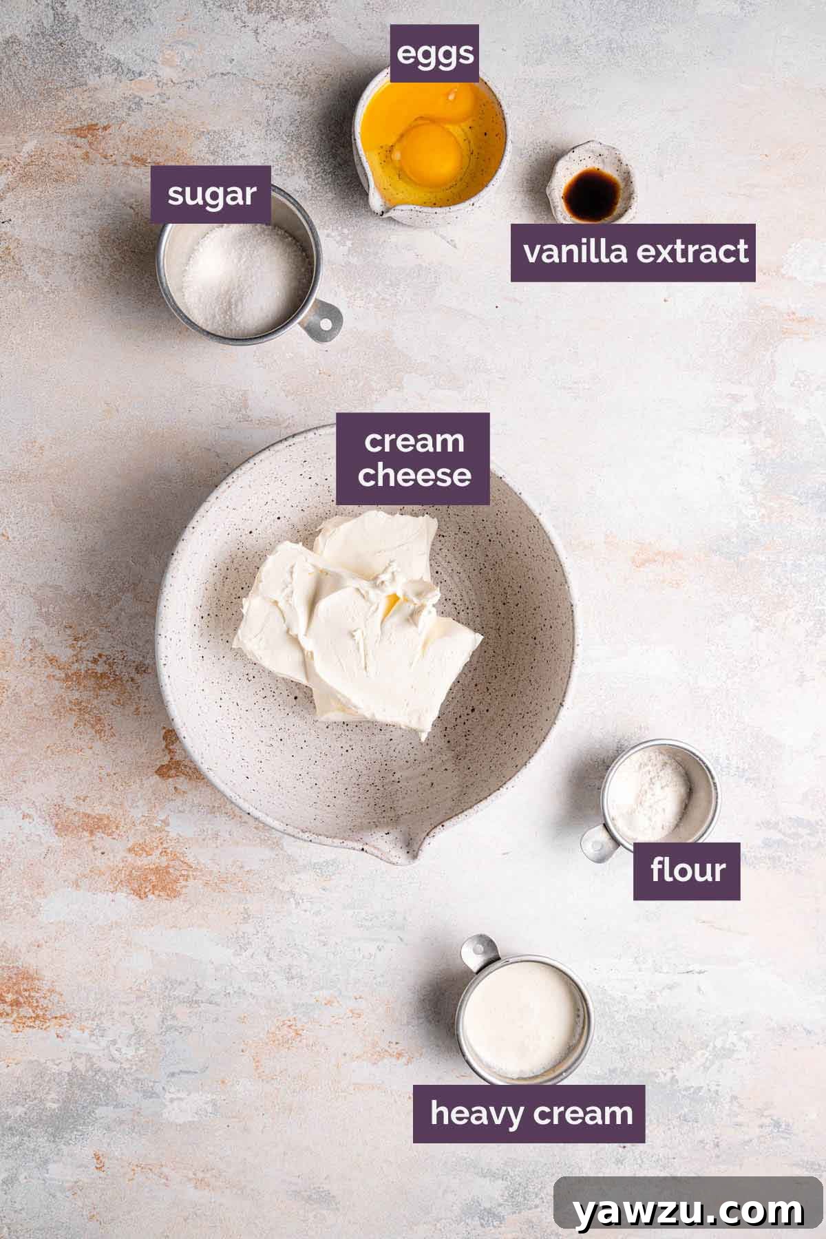 Ingredients for cheesecake layer prepped and labeled.