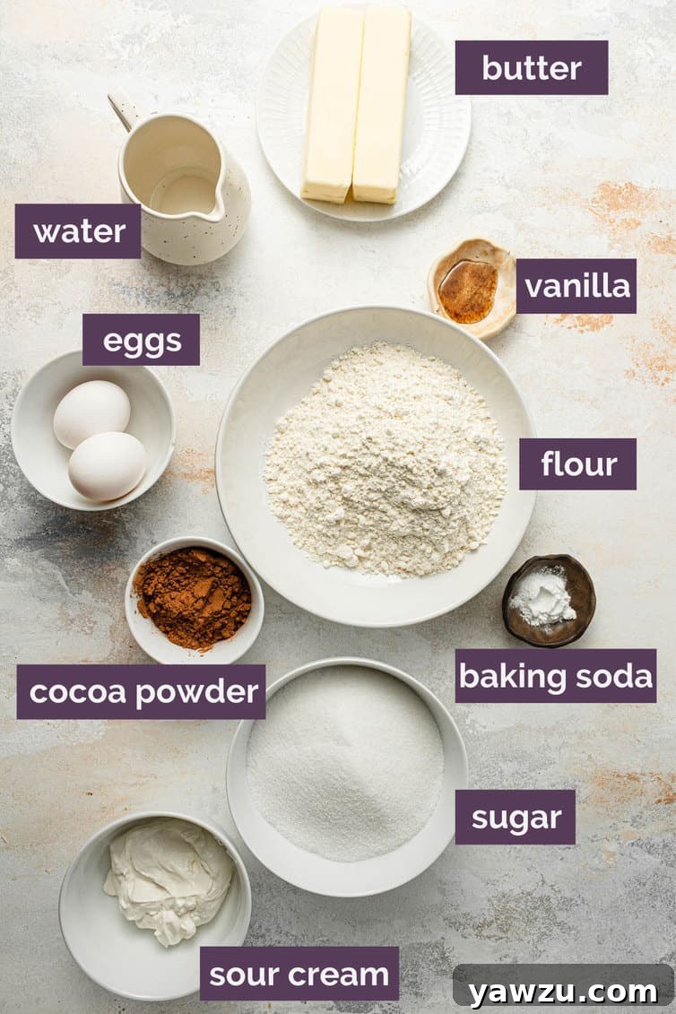 All the prepped ingredients for a classic Texas sheet cake laid out neatly in bowls on a kitchen counter.