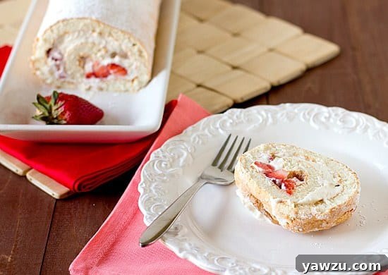 Preparing the delicate angel food cake batter for a perfect roll.