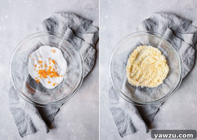 A close-up image showing hands gently rubbing fresh orange zest into granulated sugar, a key step for maximum flavor.