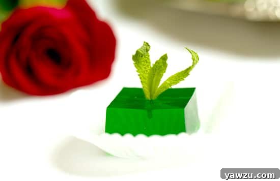 Slice of Chocolate Bourbon Walnut Pie, a perfect dessert pairing for Mint Julep Jell-O Shots