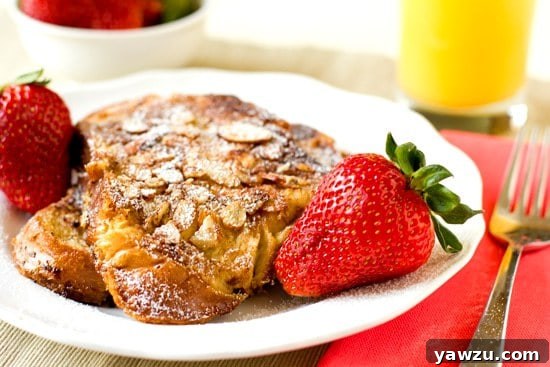 Golden-brown Cinnamon-Almond French Toast slices, perfectly garnished