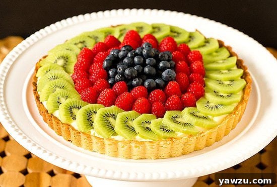 Fresh Fruit Tart with Pastry Cream featuring a golden crust and vibrant fruit