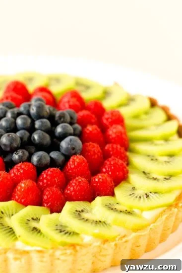 Overhead shot of a Fresh Fruit Tart with a colorful fruit arrangement