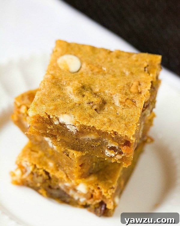 Close-up of a stack of gooey Pumpkin Blondies