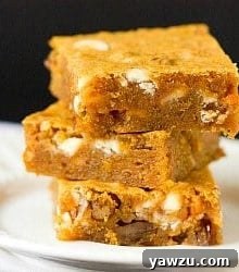 A top-down view of freshly baked Pumpkin Blondies in a pan.