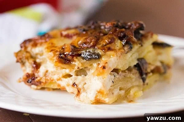 Bacon and Mushroom Potato Gratin with a golden-brown top, ready to be served at a holiday table