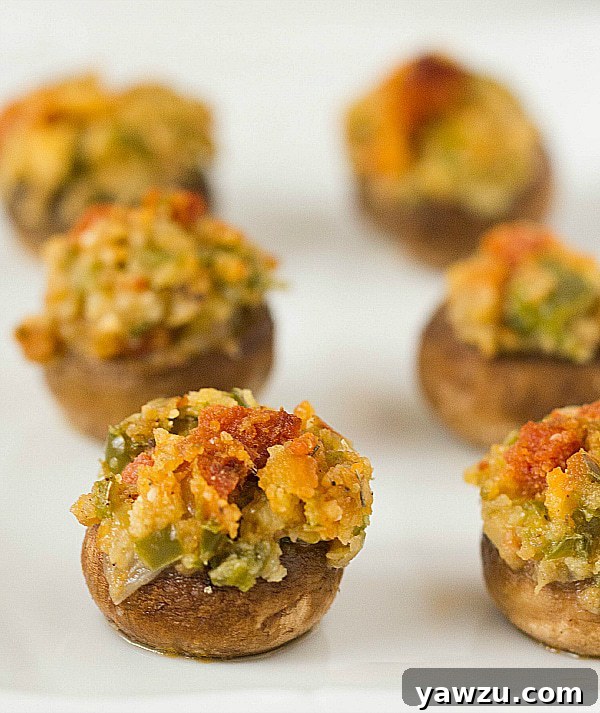 Close-up of freshly baked Italian-Style Stuffed Mushrooms, showing the savory filling