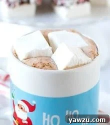 A close-up of a homemade peppermint marshmallow, square-shaped and perfectly white.
