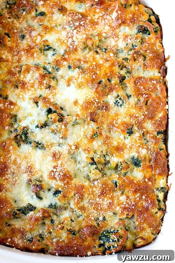 Close-up of baked Cheesy Sausage Spinach Breakfast Casserole