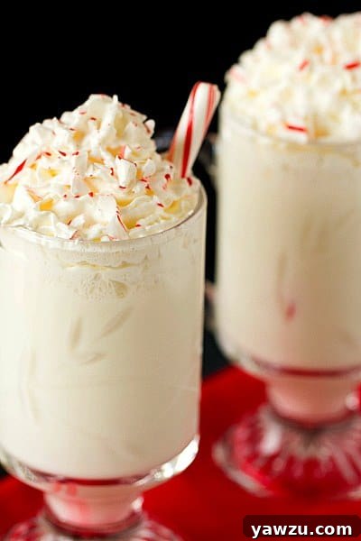 White Chocolate Steamers - A festive holiday drink with whipped cream and candy canes