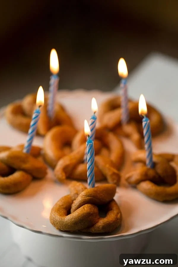 Einstein Enjoying His Sweet Potato Pretzel Birthday Treats