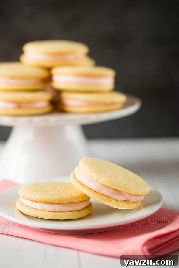 Pink Grapefruit Sandwich Cookies - A beautifully arranged stack of cookies