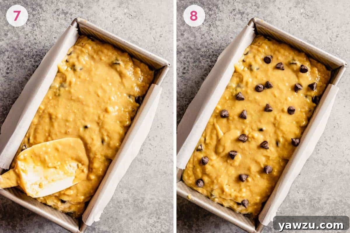 Smoothing banana bread batter into a loaf pan before baking.