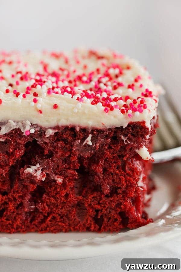 Red velvet cake is infused with sweetened condensed milk and topped with the best cream cheese frosting. A must for Valentine's Day!