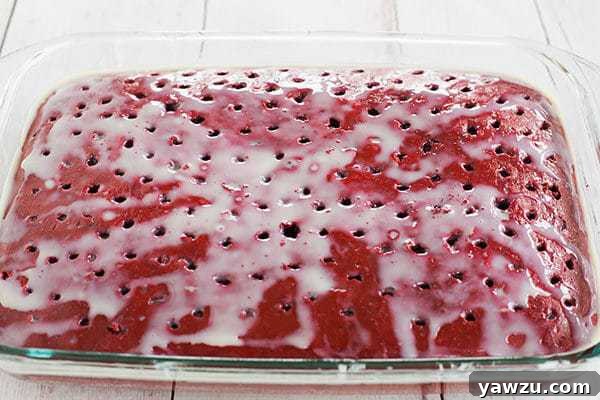 Red velvet cake is infused with sweetened condensed milk and topped with the best cream cheese frosting. A must for Valentine's Day!