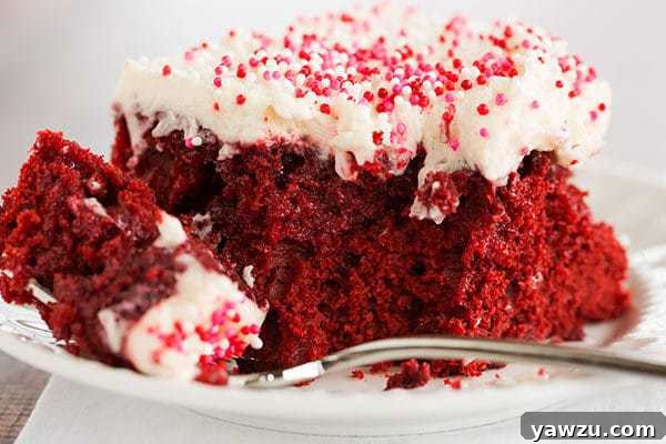 Red velvet cake is infused with sweetened condensed milk and topped with the best cream cheese frosting. A must for Valentine's Day!