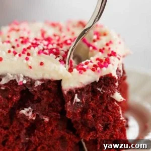 Red velvet cake is infused with sweetened condensed milk and topped with the best cream cheese frosting. A must for Valentine's Day!