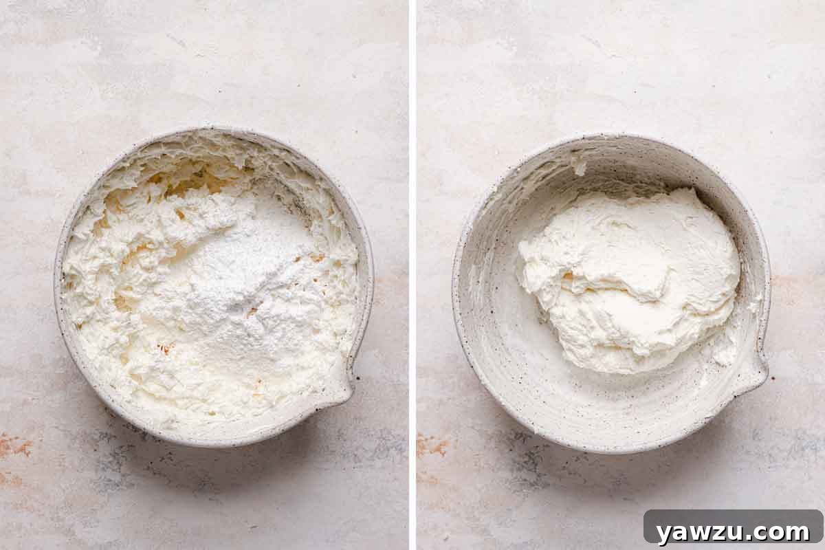 Marshmallow filling for gobs mixed together in a white speckled bowl, showing its creamy and airy texture.