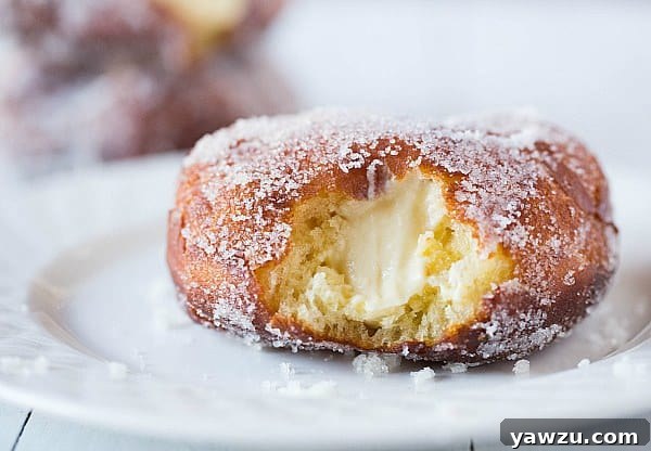 Vanilla Cream-Filled Doughnuts - Golden brown and ready to be filled