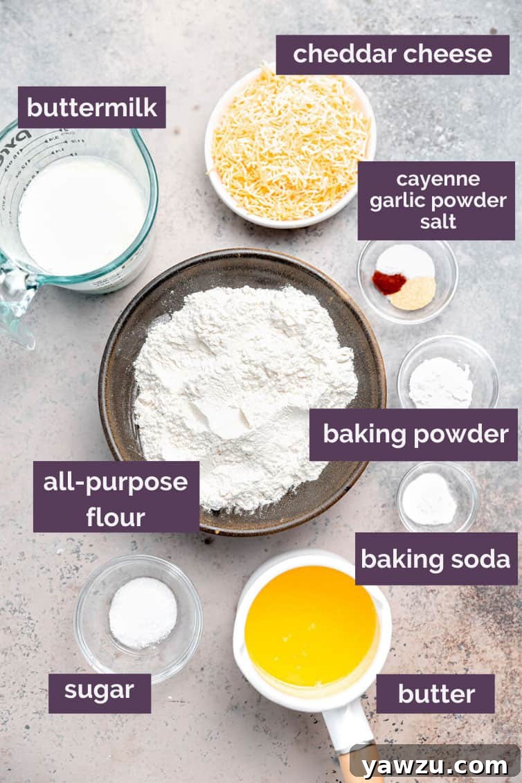 Individual ingredients for cheddar bay biscuits, carefully prepped and laid out for baking.