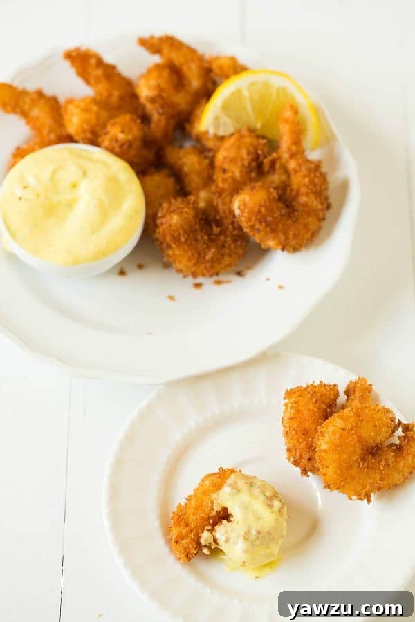 Coconut Shrimp with Mango Dipping Sauce served on a platter