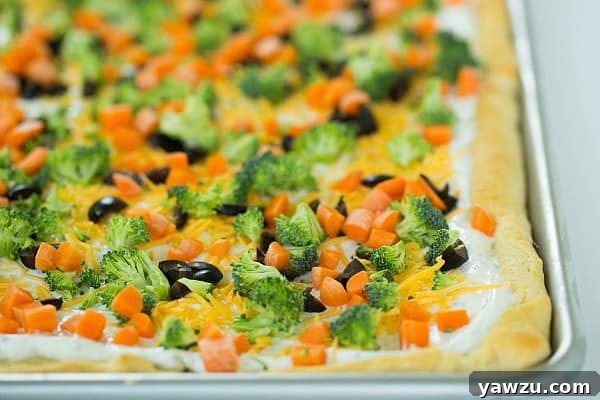 Close-up of Veggie Pizza Appetizer Topped with Fresh Vegetables