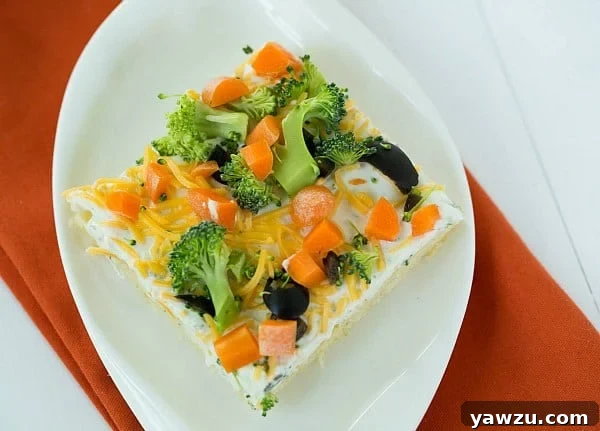 Assembled Veggie Pizza Appetizer Ready for Chilling