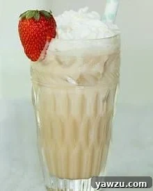 A vibrant Chocolate Italian Cream Soda garnished with whipped cream and chocolate, showcasing its delicious appeal.