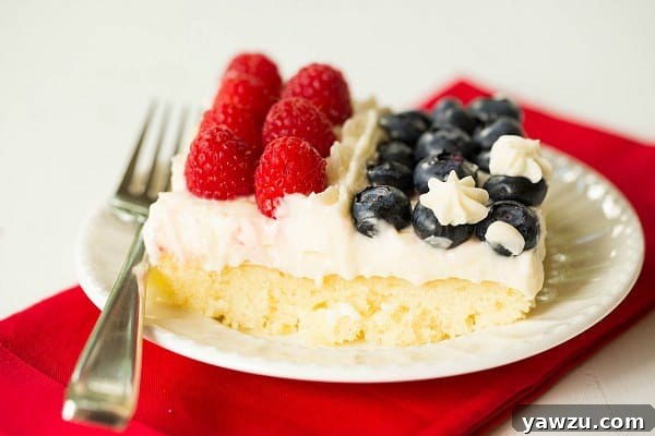 Homemade Flag Cake decorated with blueberries and raspberries for the 4th of July