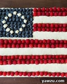 Flag Cake with colorful berries and frosting