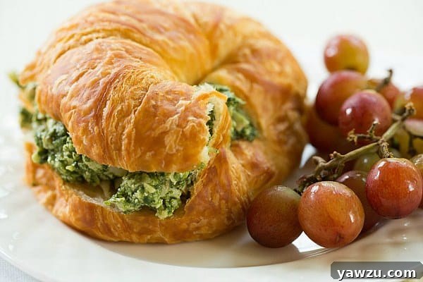 Closeup of Pesto Chicken Salad, highlighting its creamy texture and fresh ingredients.