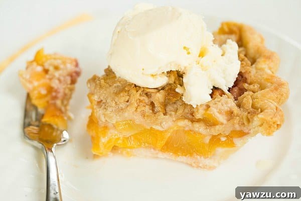 Freshly baked Peach Crumble Pie, ready to be served.