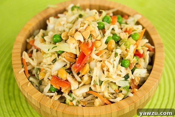 Close-up of Thai Peanut Cabbage Slaw, showcasing its colorful ingredients and creamy peanut dressing