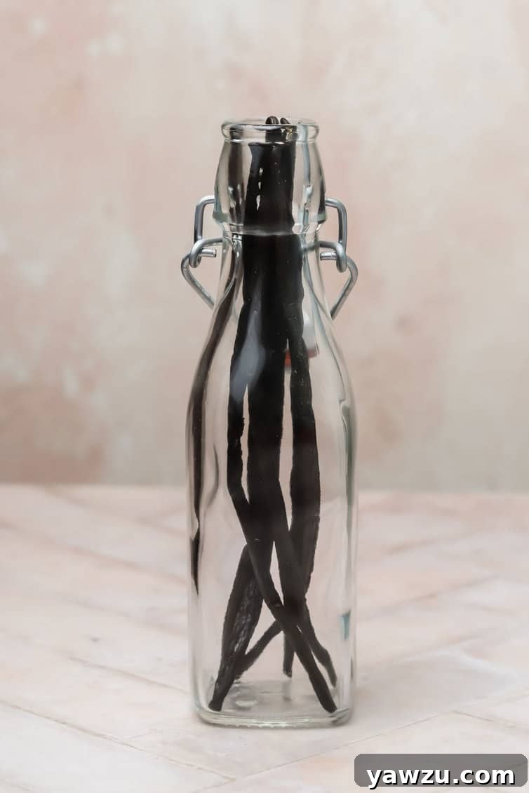 Vanilla beans in a glass bottle.
