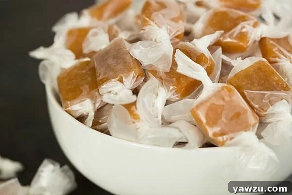 Delicious Apple Cider Caramels, perfectly cut into squares and ready for wrapping.