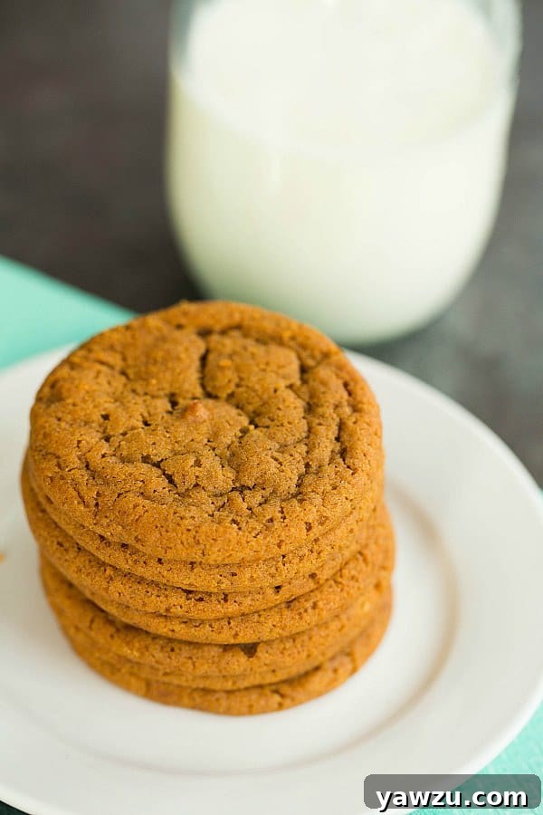 Delicious Soft and Chewy Gingersnap Cookies arranged on a cooling rack
